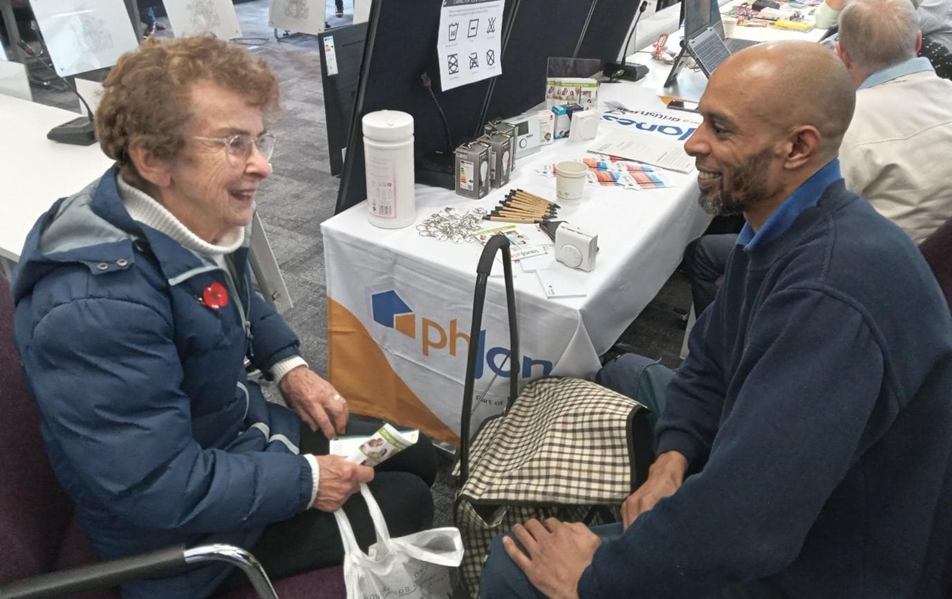 A resident receiving practical home-energy guidance.